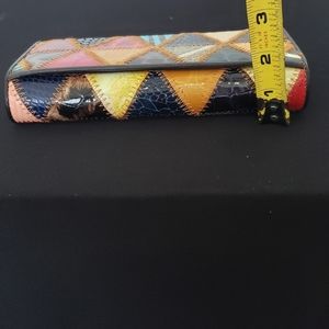 Temanli genuine leather bi-fold wallet.